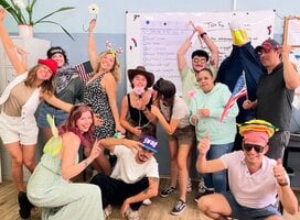 trainees in a classroom at The Language House celebrating their last day